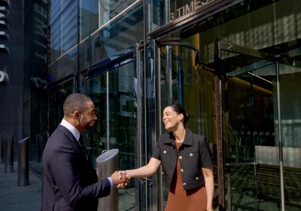 Devon and guest shaking hands