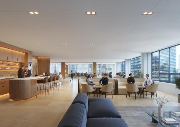 A boutique with seating for office workers faces floor to ceiling windows with a city view