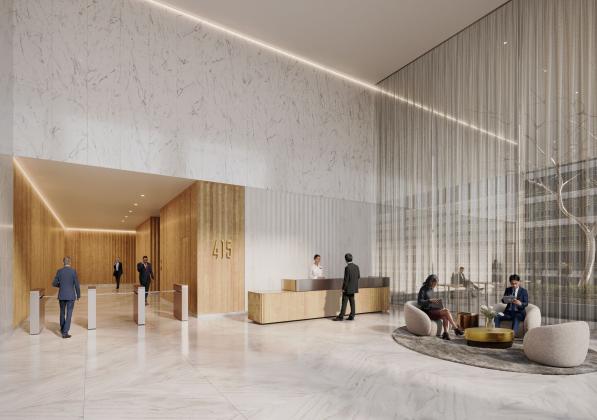 A sleek white lobby with seating and a front desk 