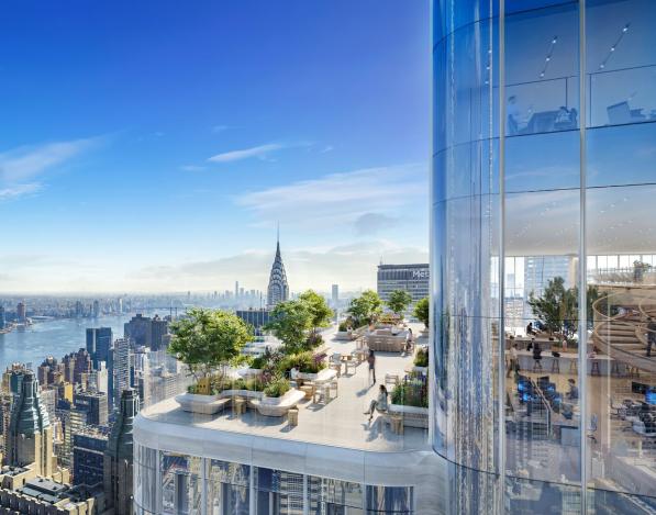 A patio on a tall building with the New York City skyline in the background