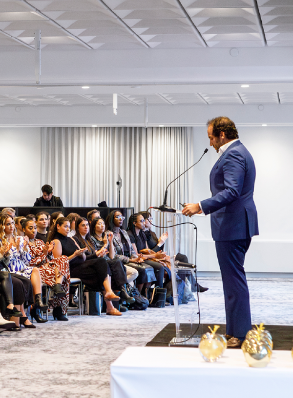 William Rudin giving a speech